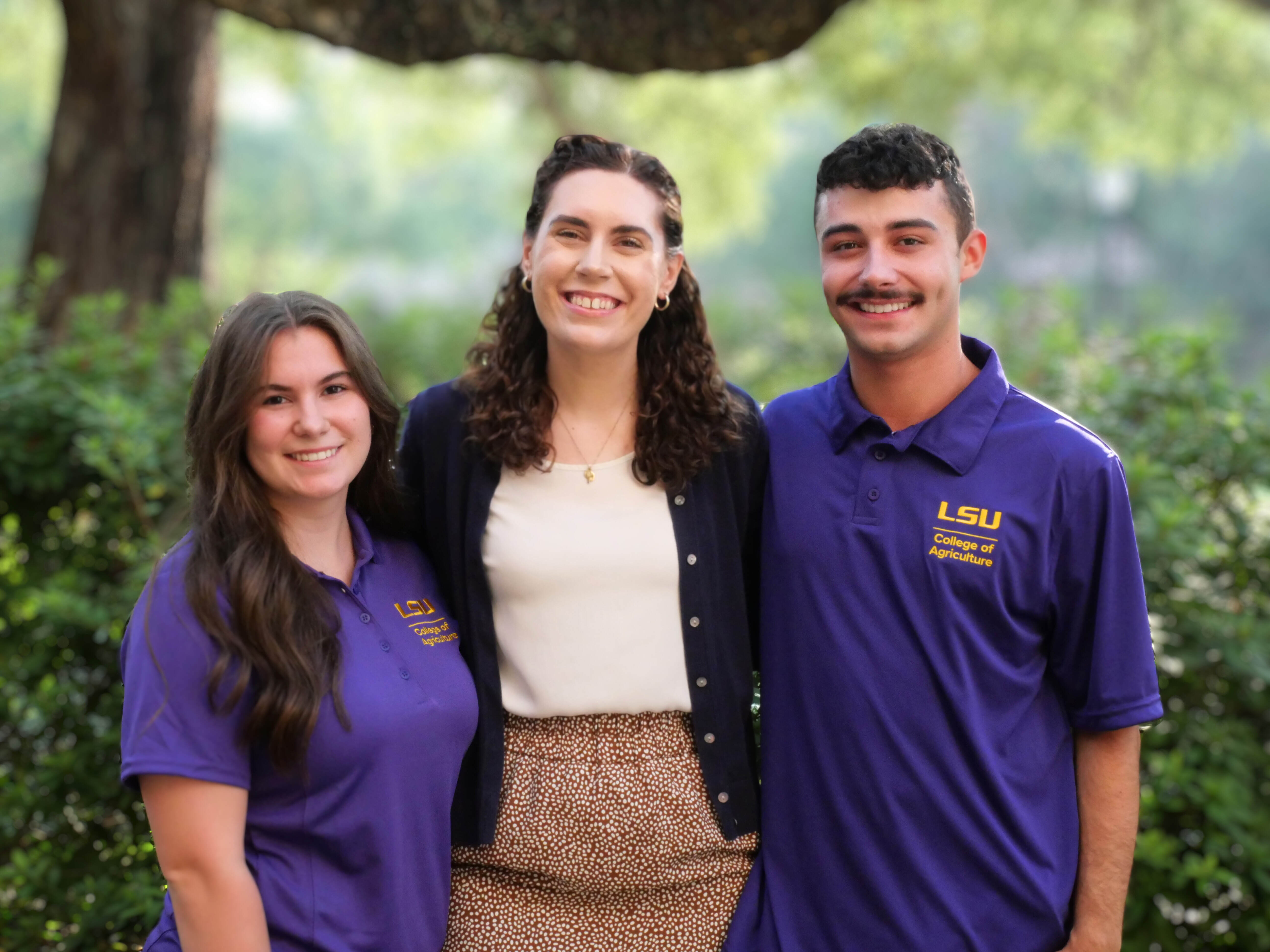 Lindsay Barelycorn stands with peer mentors, Chloe Viator and Francis DiSalvo