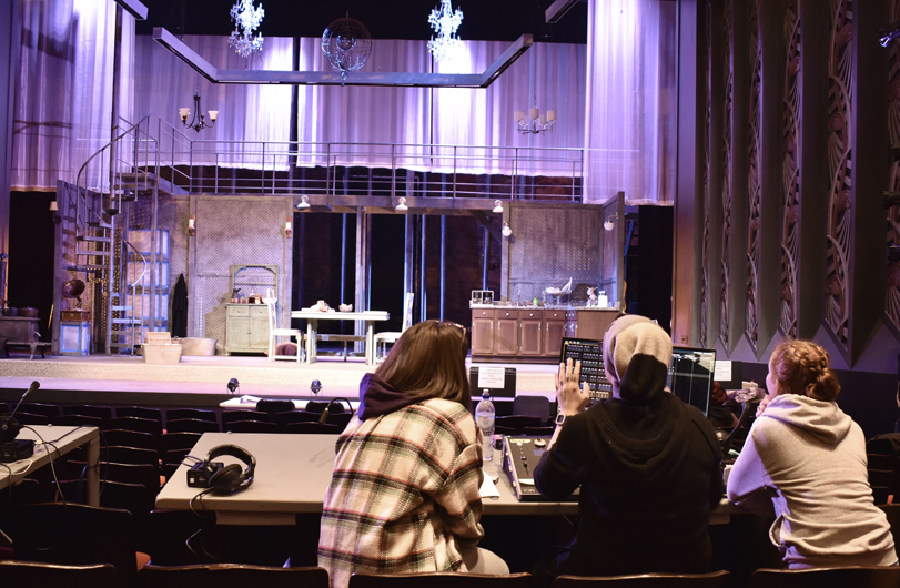 students working in a theatre