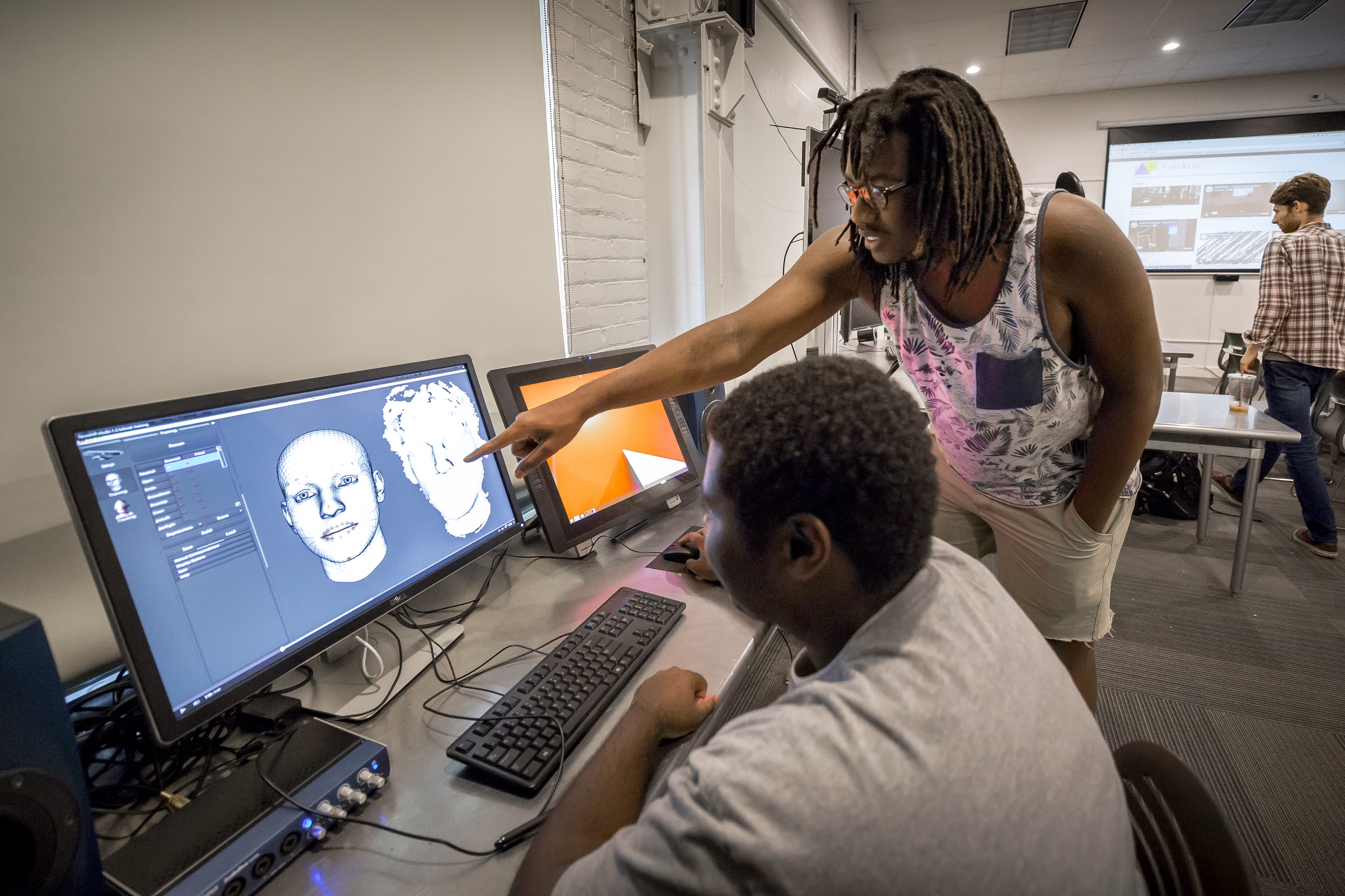 photo: student working on laptop