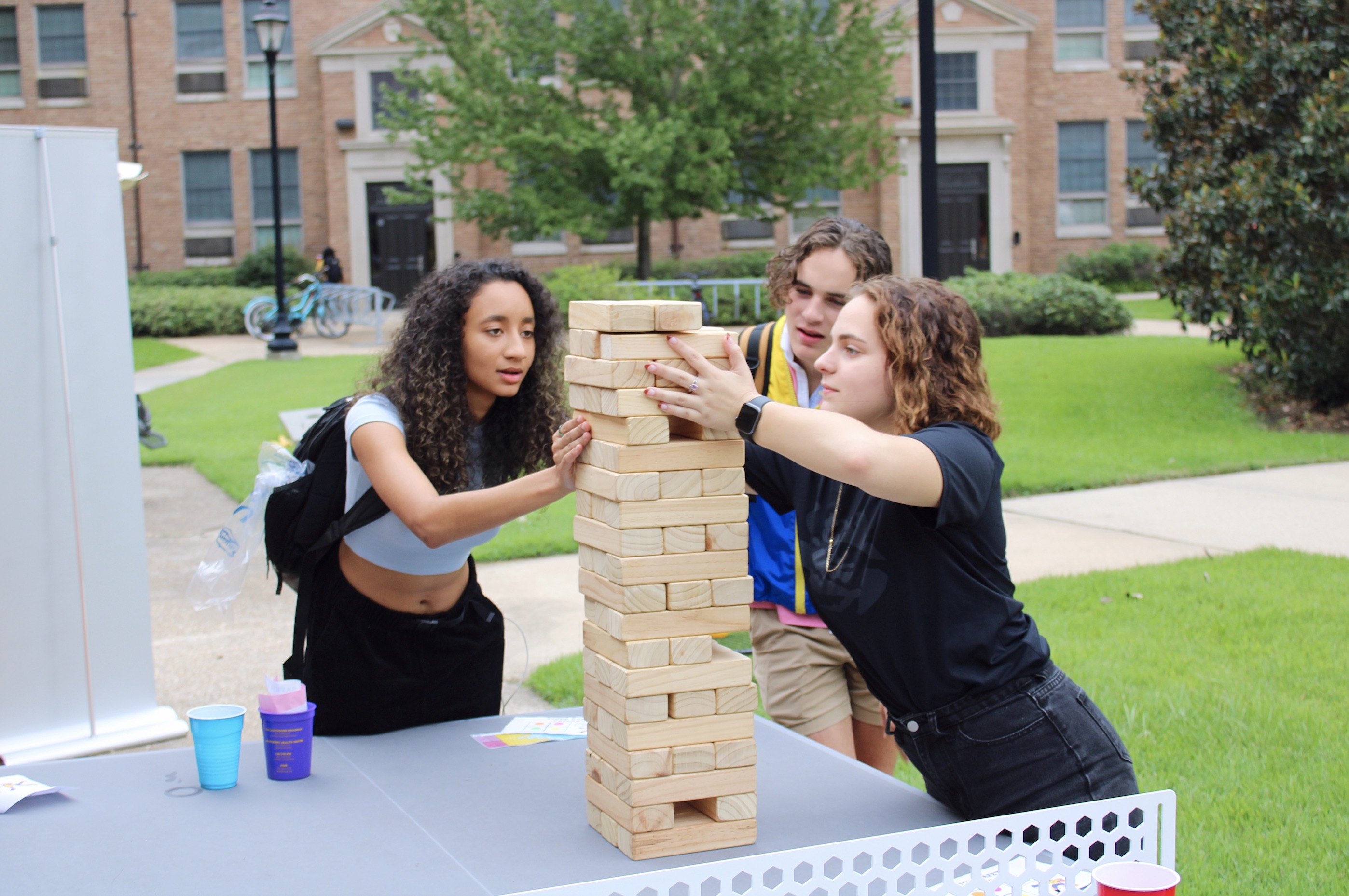 Pentagon Community residents playing jenga