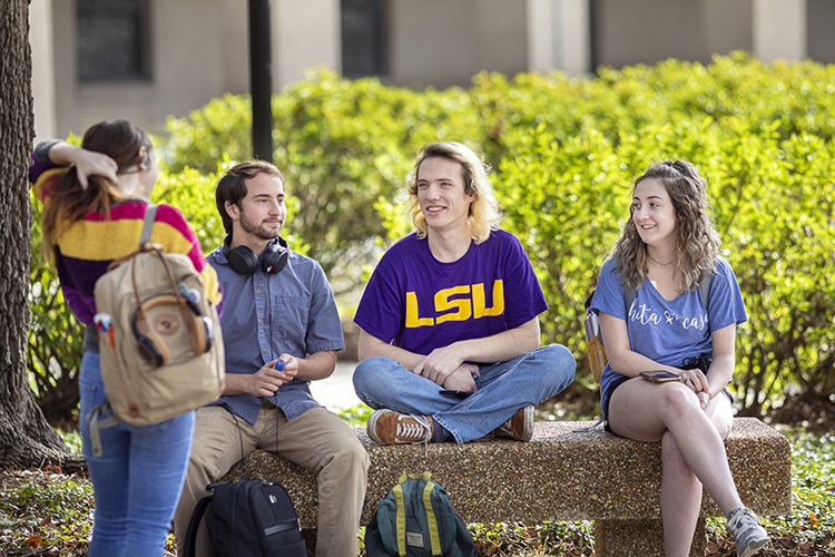 students talking in quad