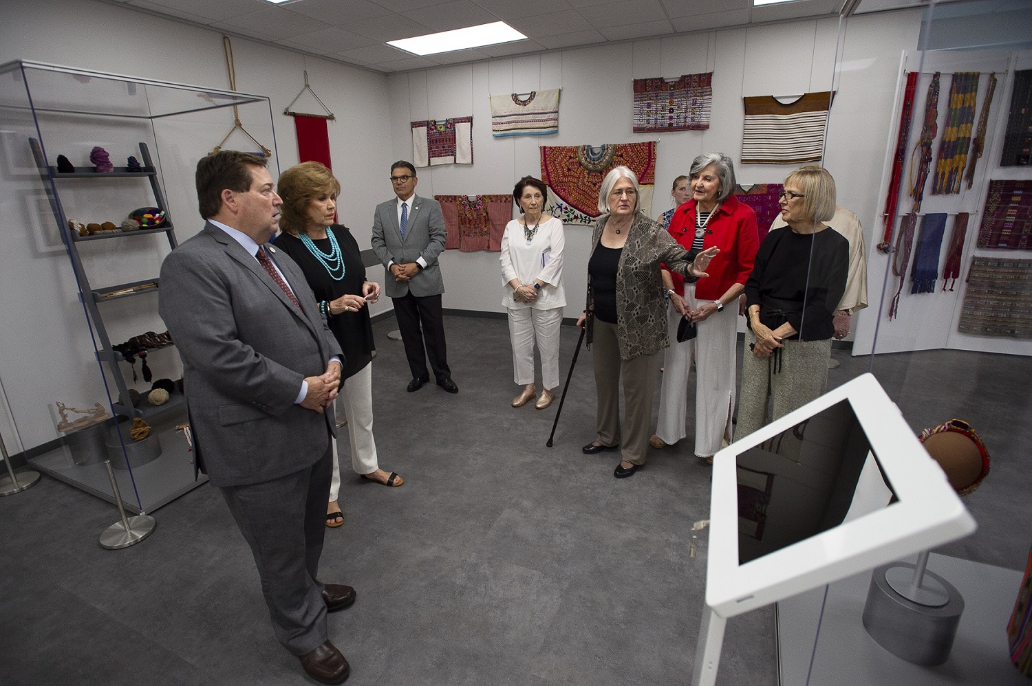 Dr. Kuttruff explaining exhibition piece.